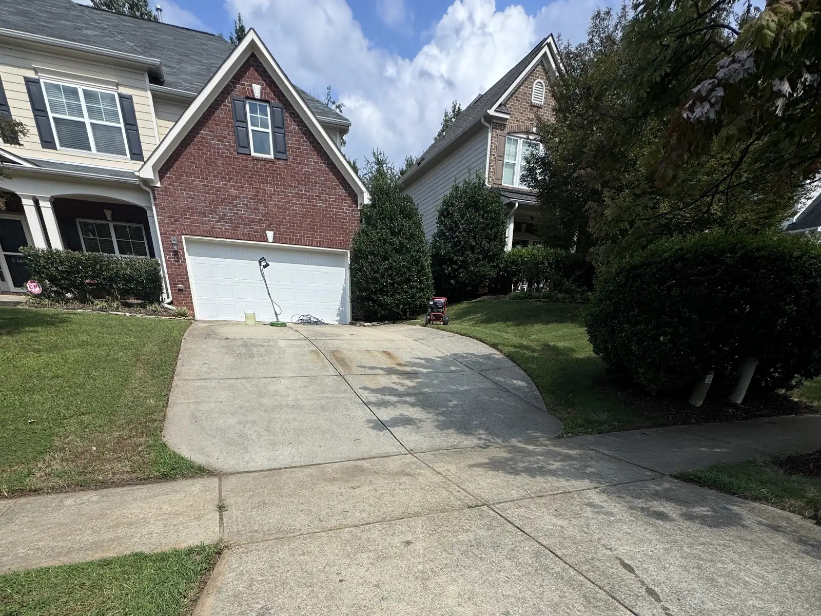 Concrete patio adjacent to cleaned wood deck in Garner NC 27529